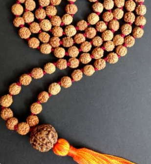 Perle du guru et pompon du mala